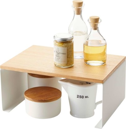 Picture of YAMAZAKI Home Tosca Wood-Top Stackable Kitchen Rack - Modern Counter Shelf Organizer - Large - Steel + Wood - Stack Up to Two | Modern countertop shelf riser maximizes kitchen space. Stackable design. Freestanding rack with a warm wood-top plate.