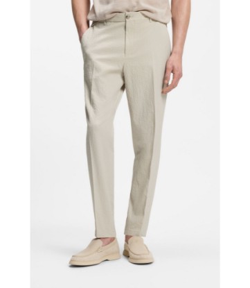 Tapered-fit trousers in stretch-cotton seersucker