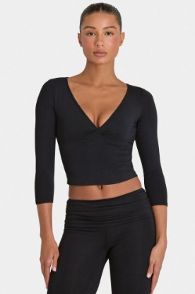 Bo+Tee model Kiele wearing the BT16395__Black Full Top in Black Modal fabric perfect for yoga sessions