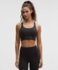 Black lululemon Energy Longline Bra Medium Support B-D Cups Evolve Wordmark
