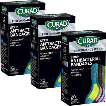Picture of Curad Performance Series Antibacterial Bandages, 1" x 3.25", 60 Count | 3 Boxes, 1 x 3.25 in, Assorted Colors, Extreme Hold Adhesive Technology, Flexible Fabric Bandages for Cuts, Scrapes and Burns